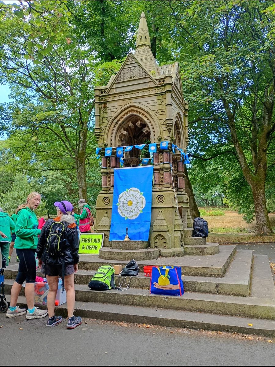 Signs at Halifax parkrun: First timers welcome meeting point 8:50am, and Halifax is hilly