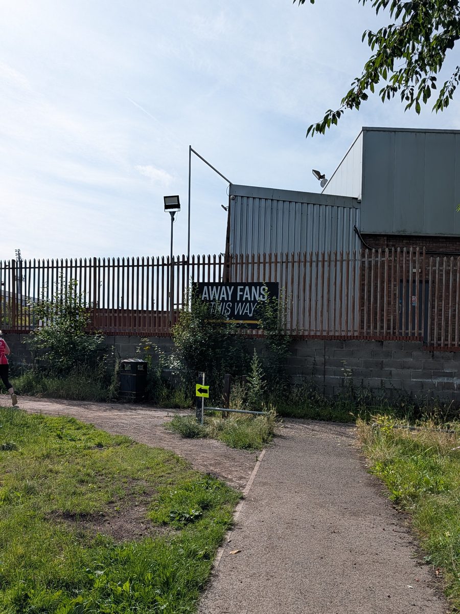 Narrow gravel path along the stadium perimeter at Vale Park parkrun